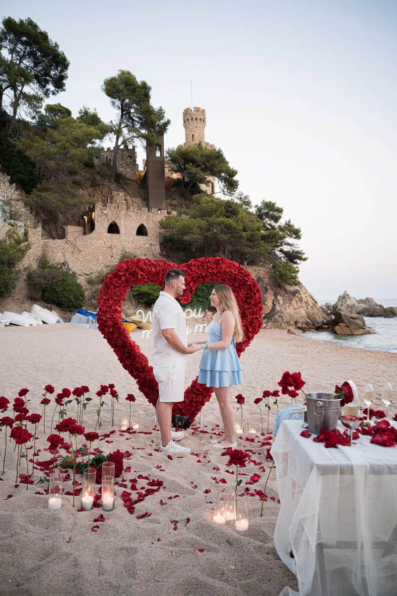 Romantic proposal setup in Barcelona – candles and roses